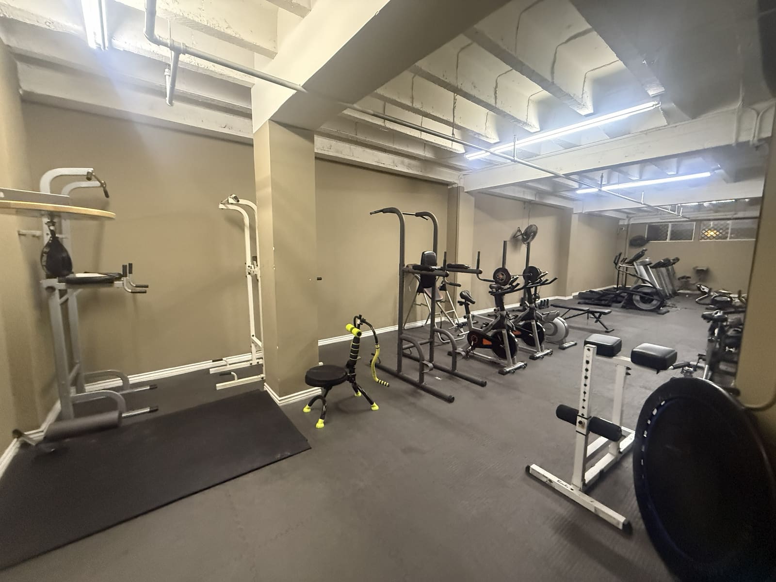 Building fitness center with strength equipment and cardio machines